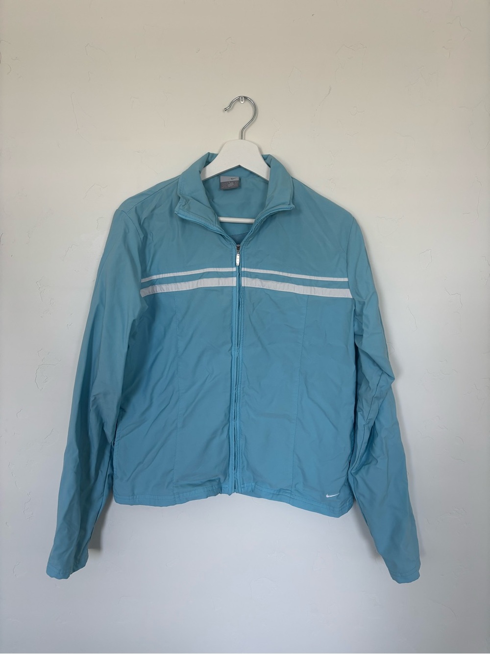 Nike Light Blue Track Jacket with White Chest Stripes